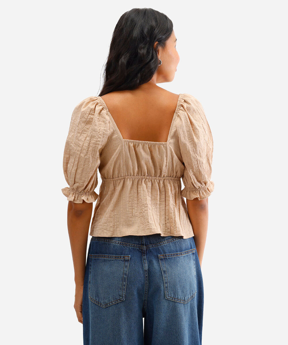 blusa feminina manga bufante texturizada bege