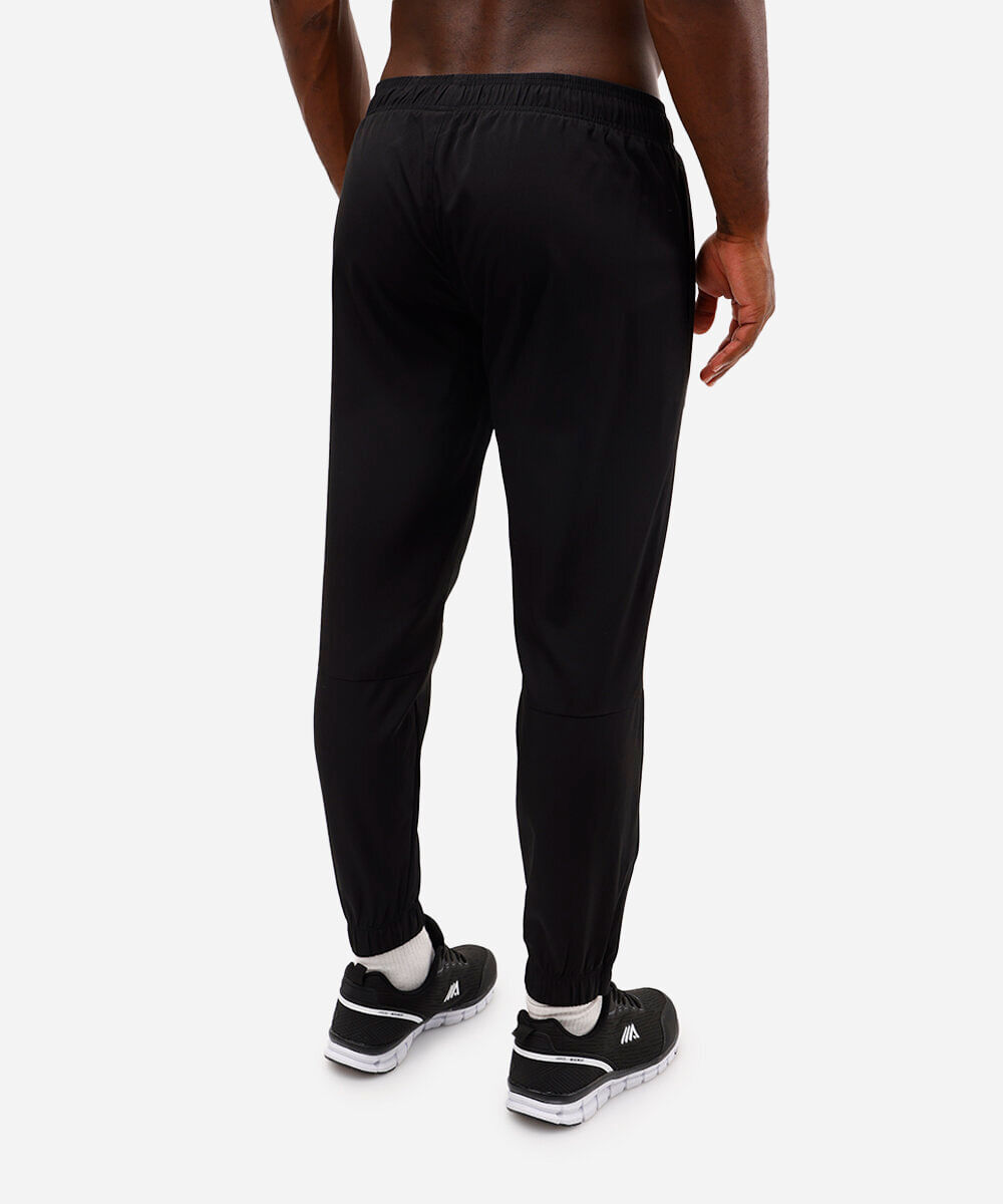 calça jogger slim com zíper na barra esportiva preta