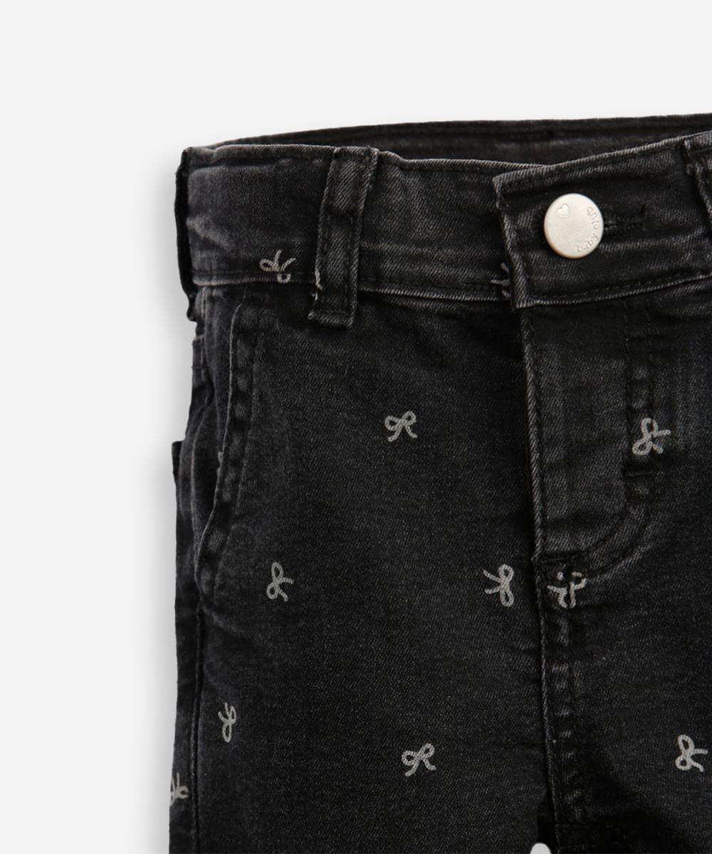 calça flare infantil jeans lacinhos e barra desfiada preta