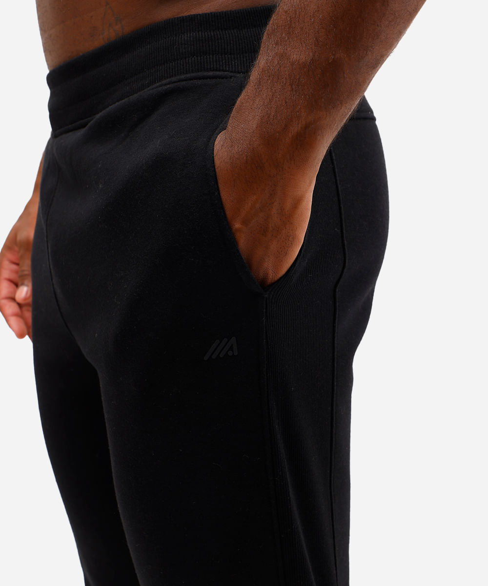 calça jogger masculina de moletom esportiva com textura preta