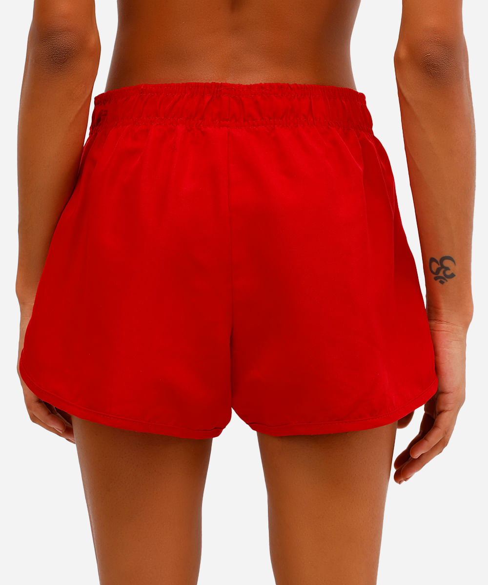 short running feminino com bolso esportivo ace vermelho