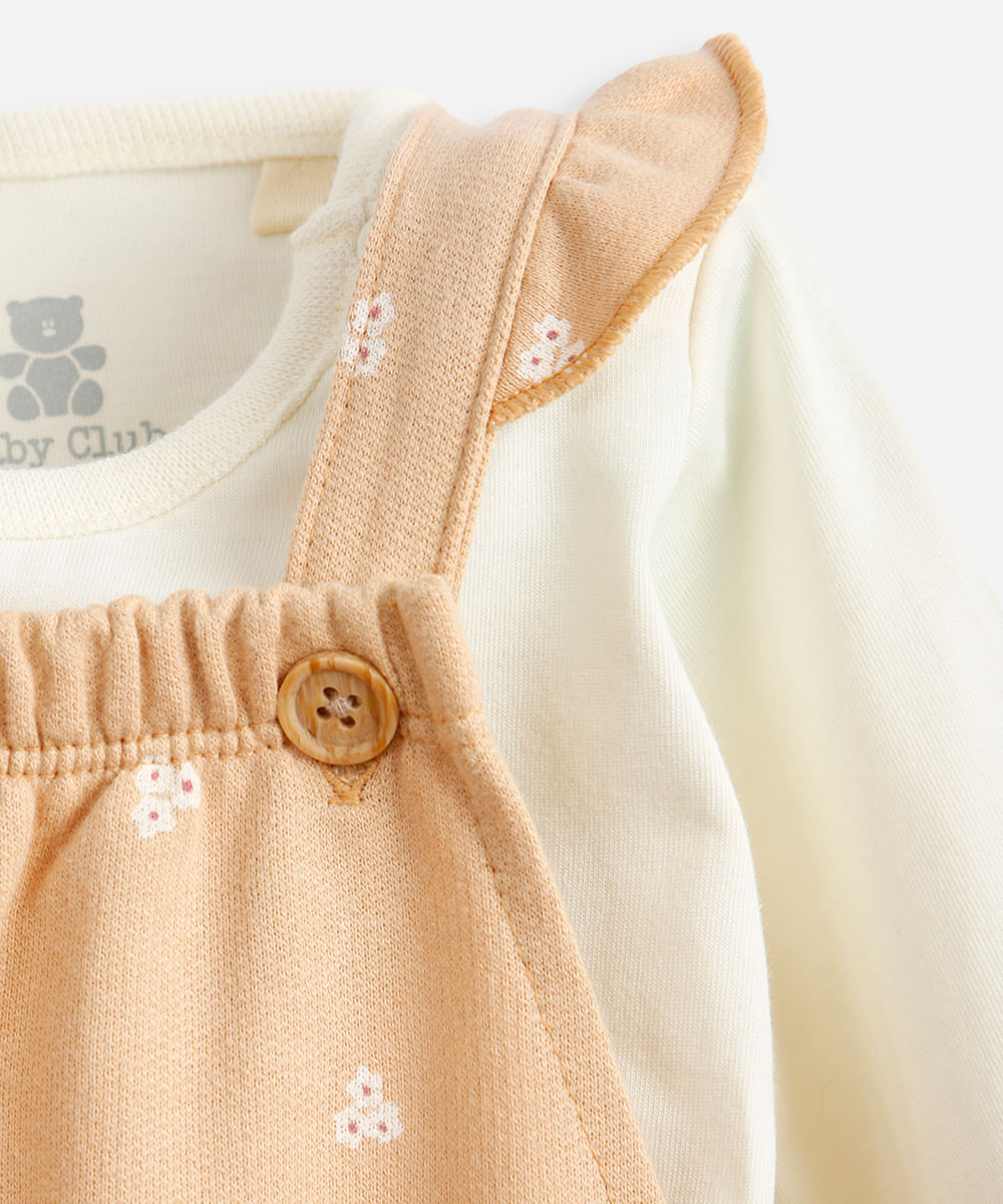 jardineira longa infantil de moletom com body floral bege