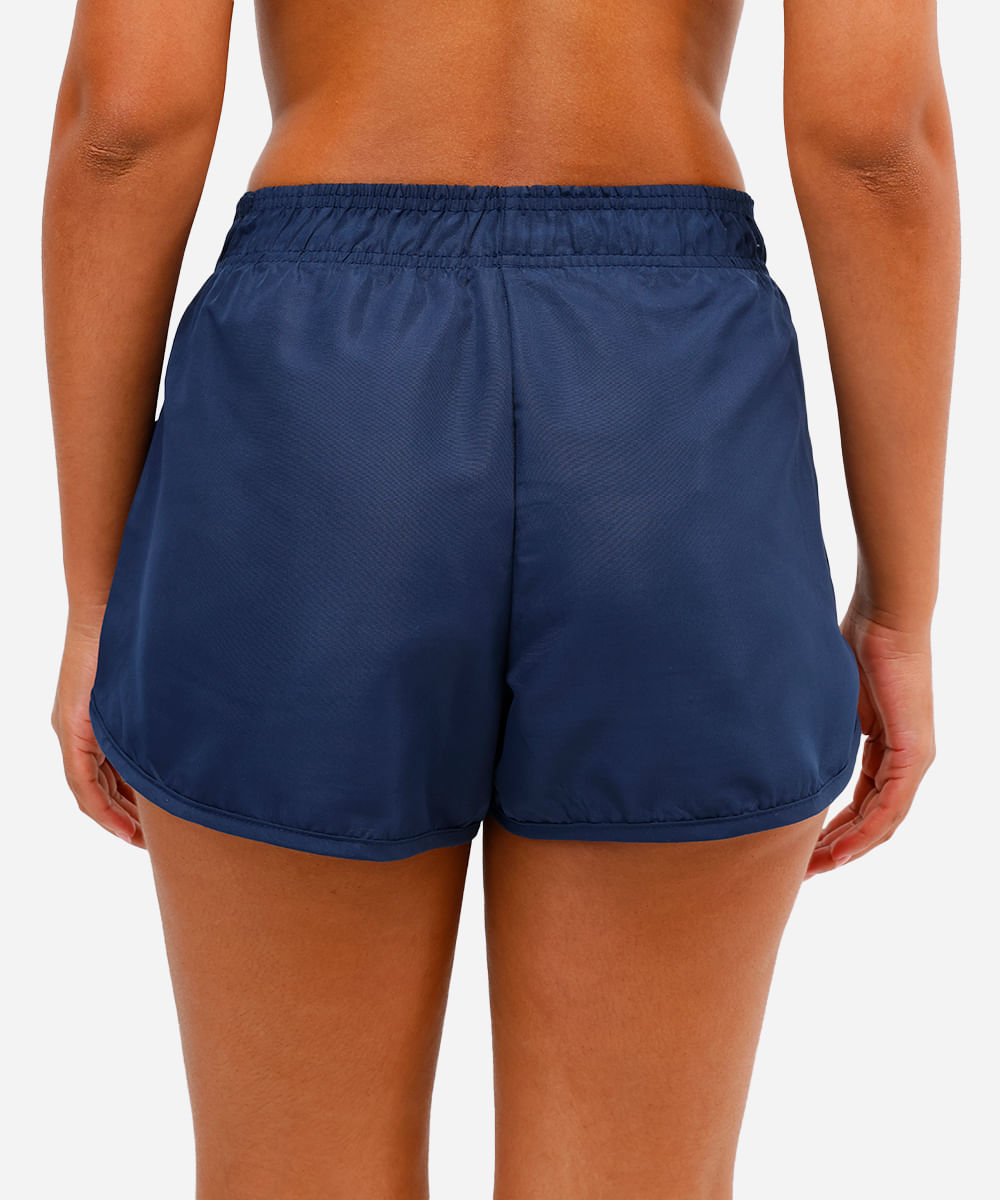 short running feminino com bolso esportivo azul