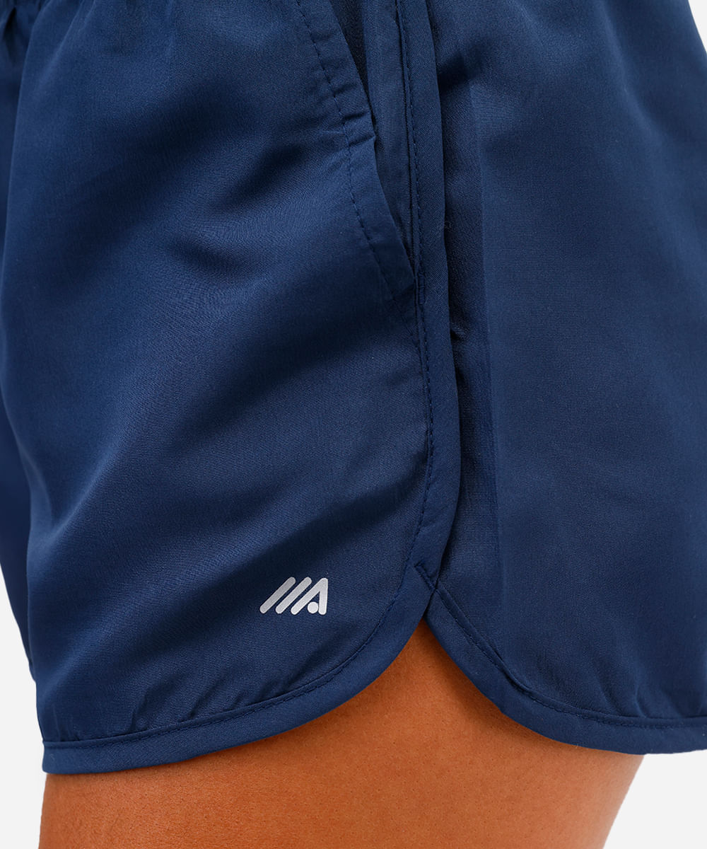 short running feminino com bolso esportivo azul