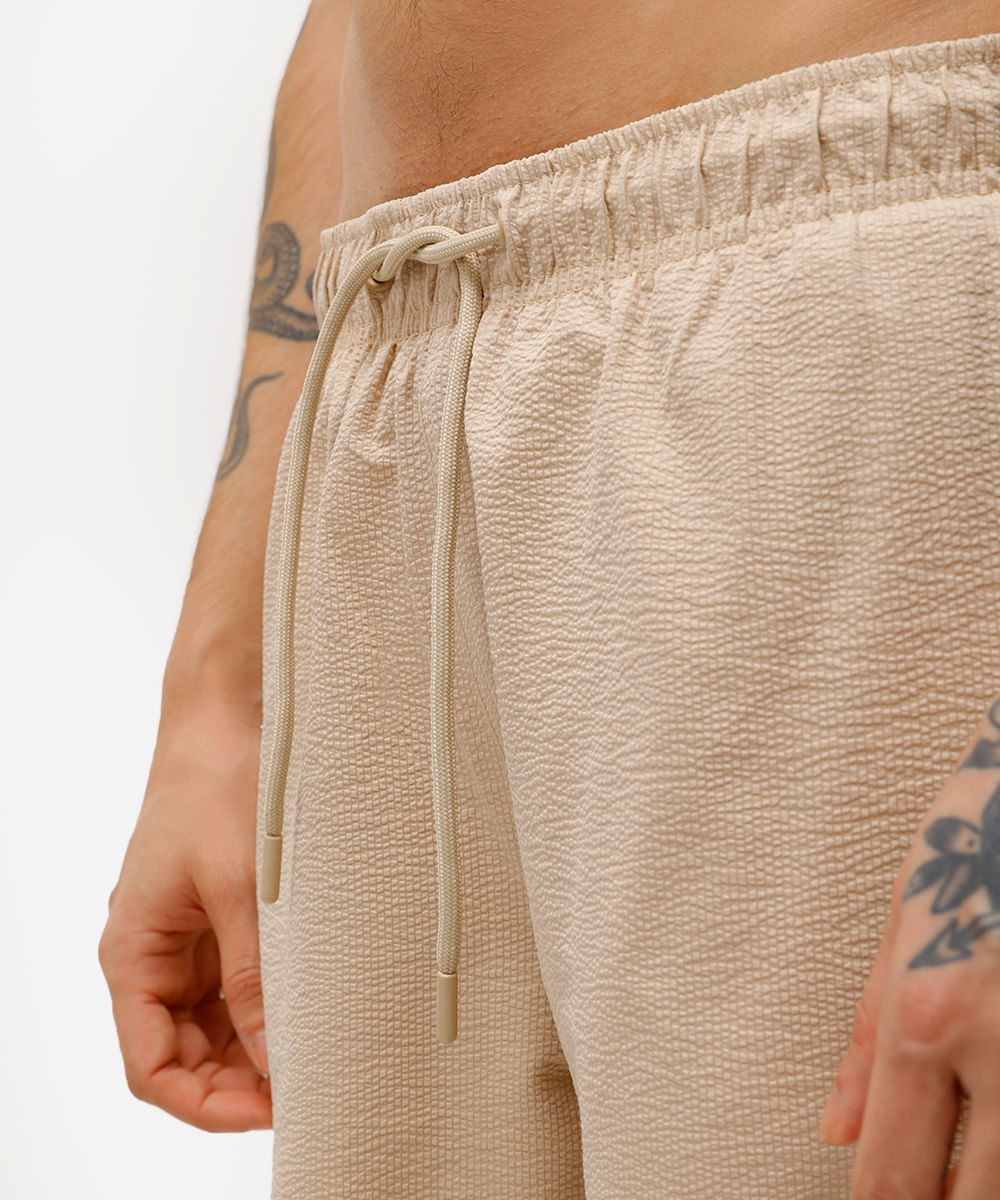 short masculino cós elástico texturizado bege