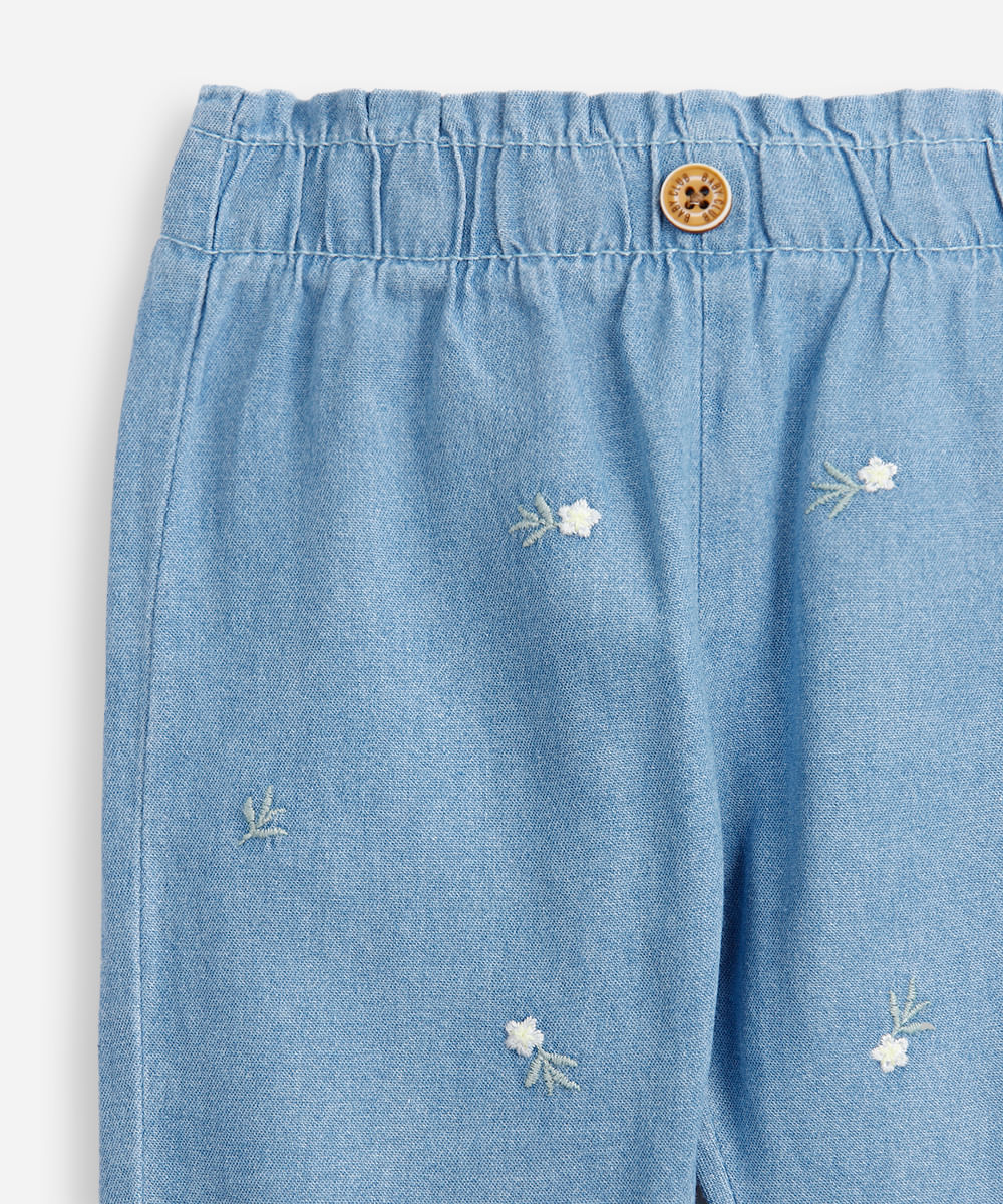 calça infantil jeans com bordado floral azul