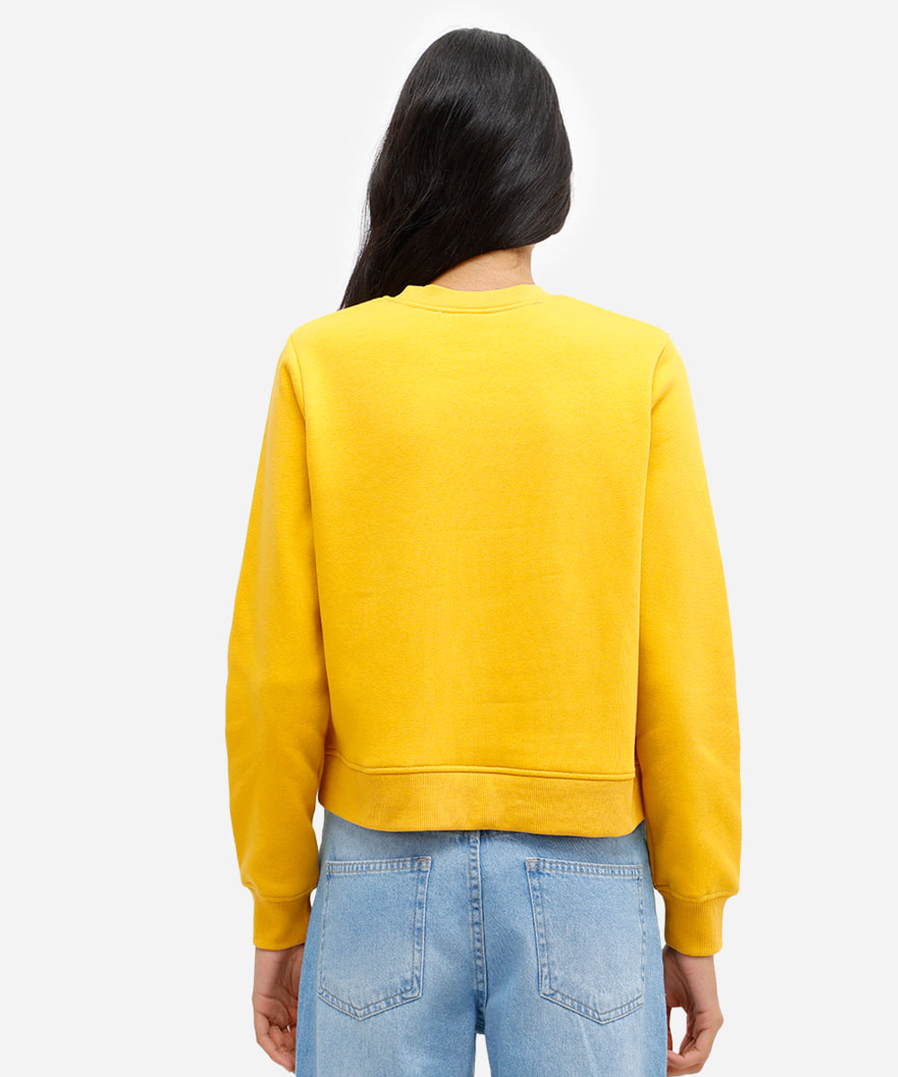 blusão feminino de moletom felpado com bordado smiley amarelo