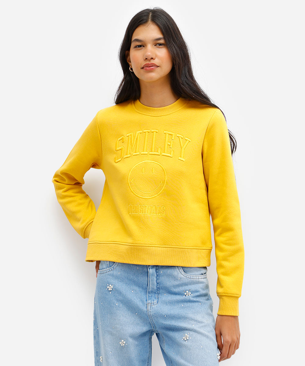 blusão feminino de moletom felpado com bordado smiley amarelo