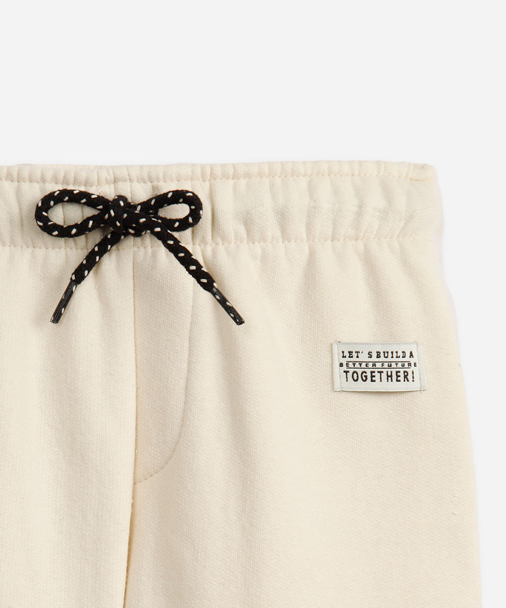 calça jogger de moletom infantil recortes bege