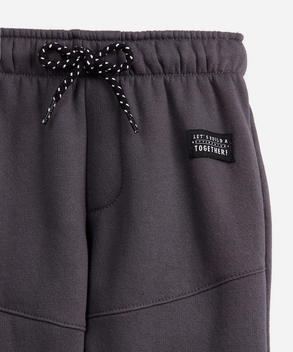 calça jogger de moletom infantil recortes cinza