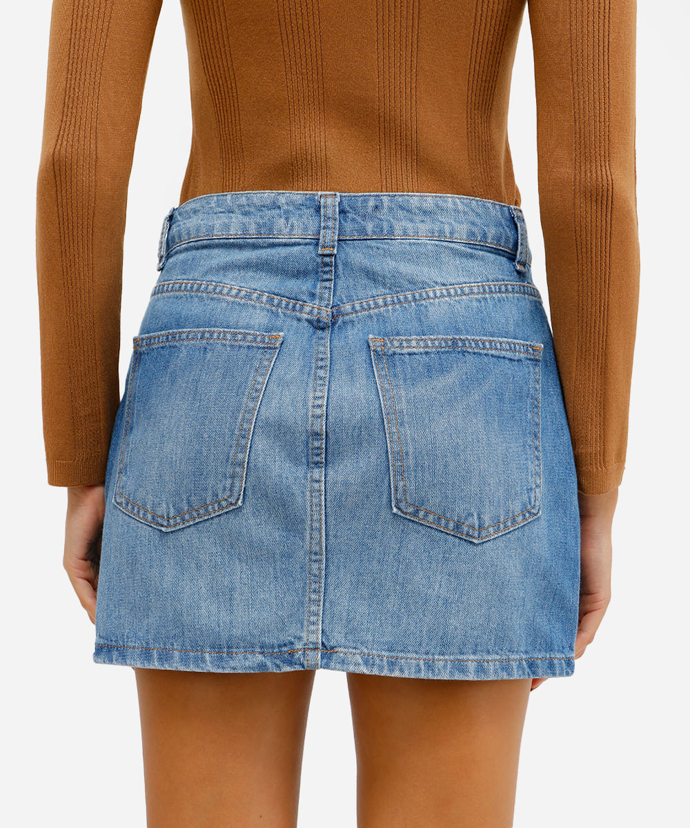 minissaia feminina jeans com tachas azul