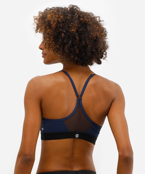 top feminino esportivo com recorte azul
