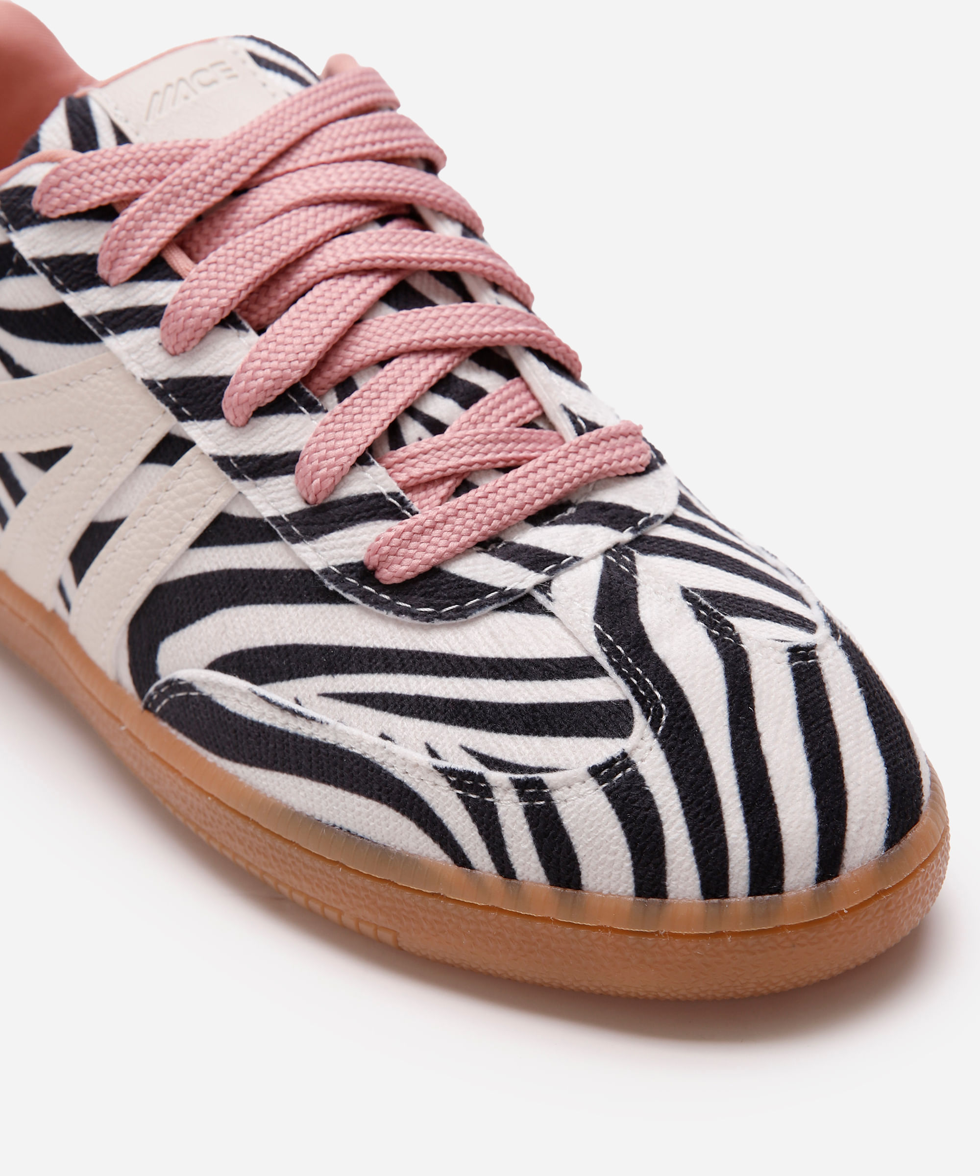 tênis bossa com recortes animal print colorido