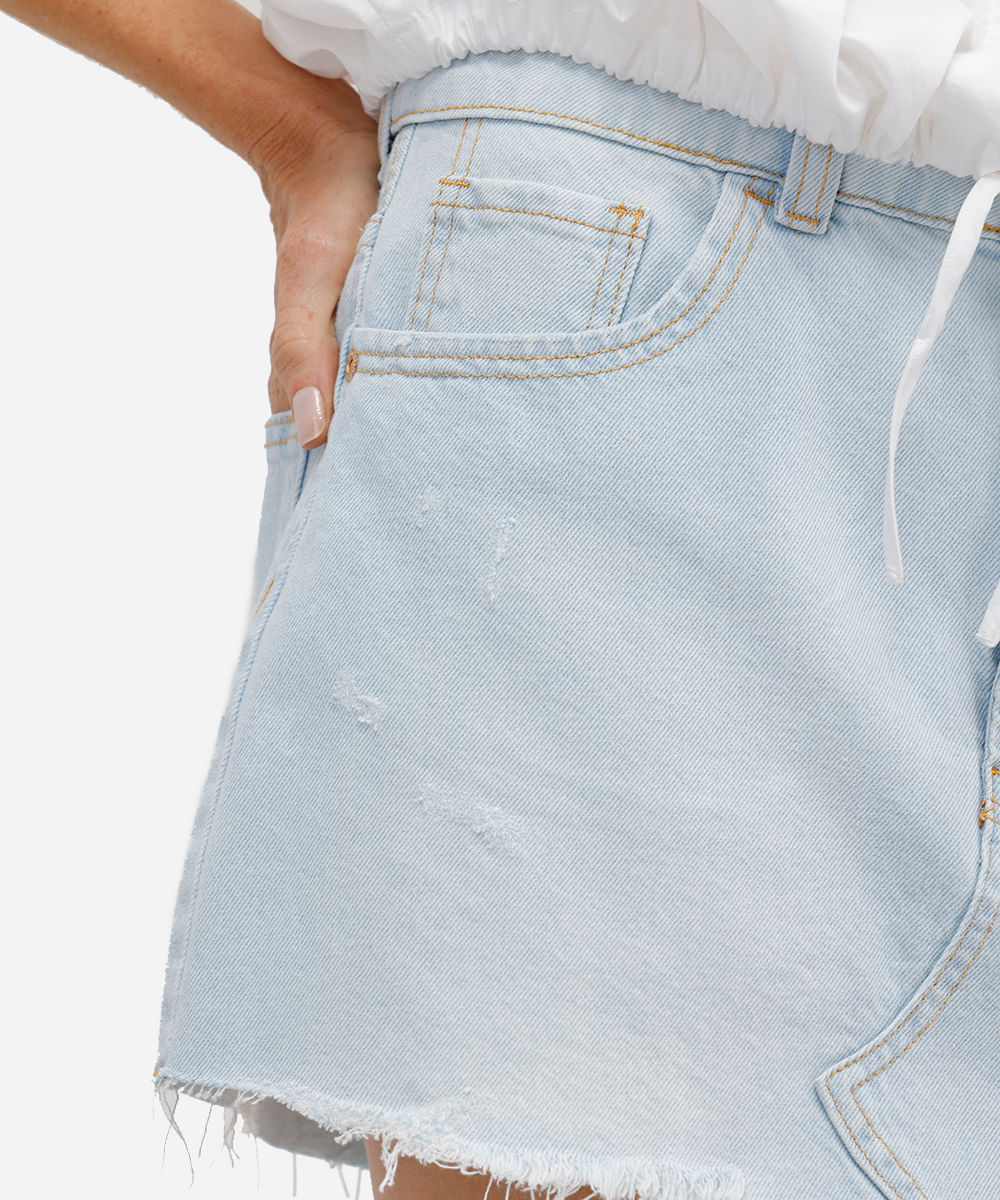 minissaia feminina jeans barra desfiada azul