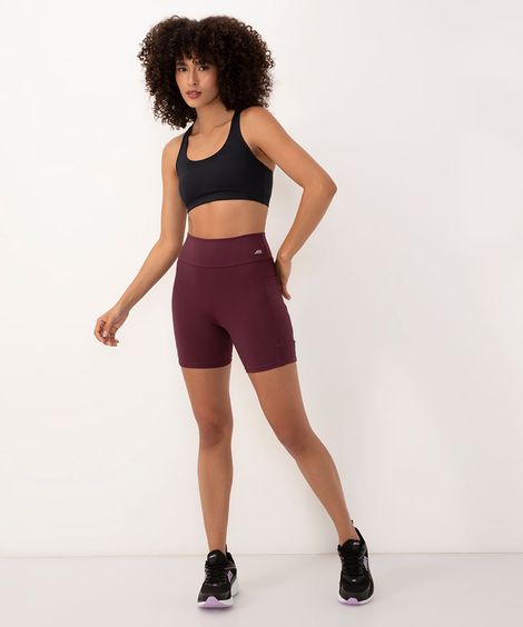 bermuda esportiva cós largo com bolso lateral roxa
