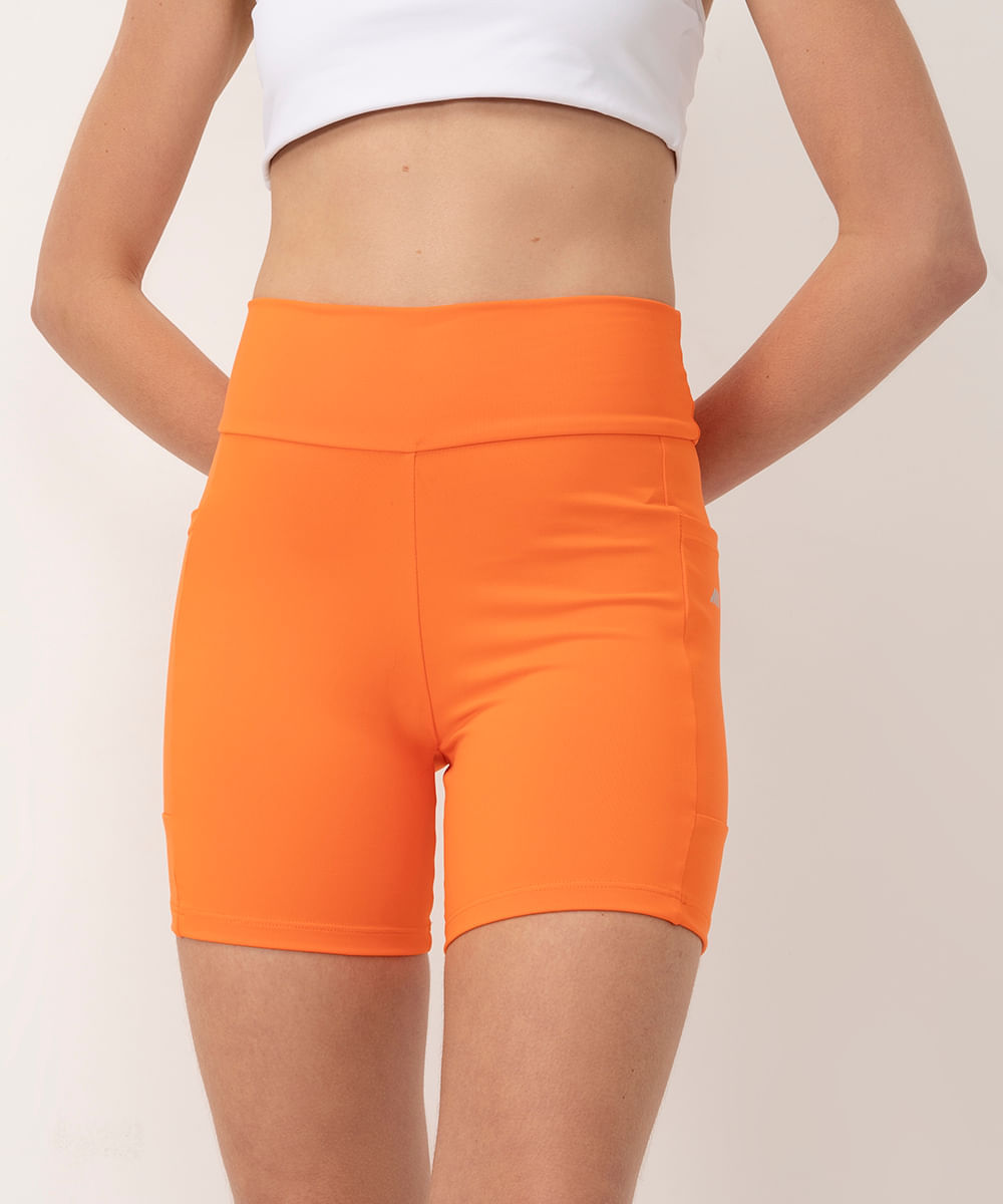 bermuda esportiva cós largo com bolso lateral laranja