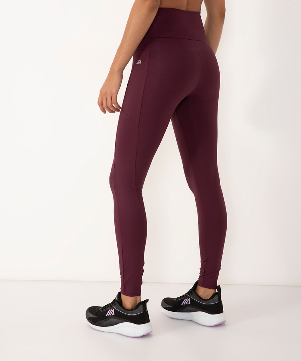 calça legging esportiva com bolso roxa