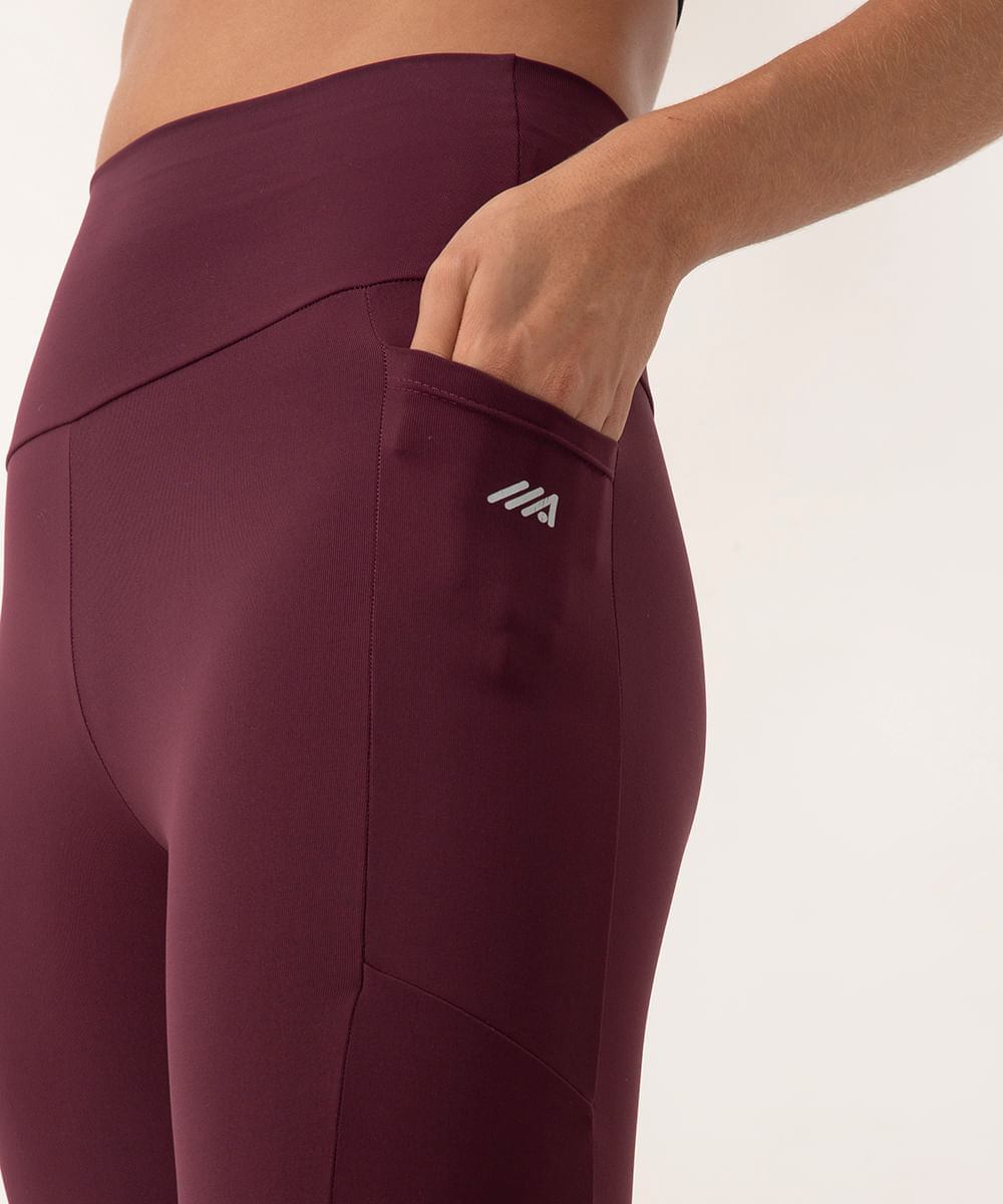 calça legging esportiva com bolso roxa