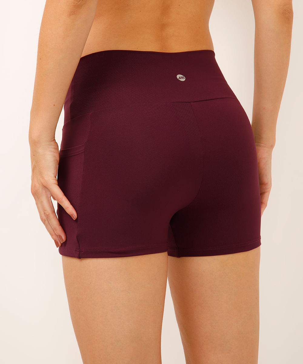 bermuda curta com bolsos esportiva roxa