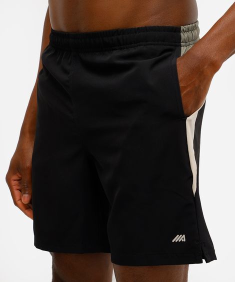 short masculino esportivo com recortes bege