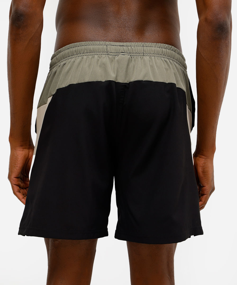 short masculino esportivo com recortes bege