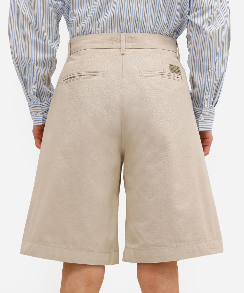 bermuda baggy masculina de alfaiataria com pregas bege