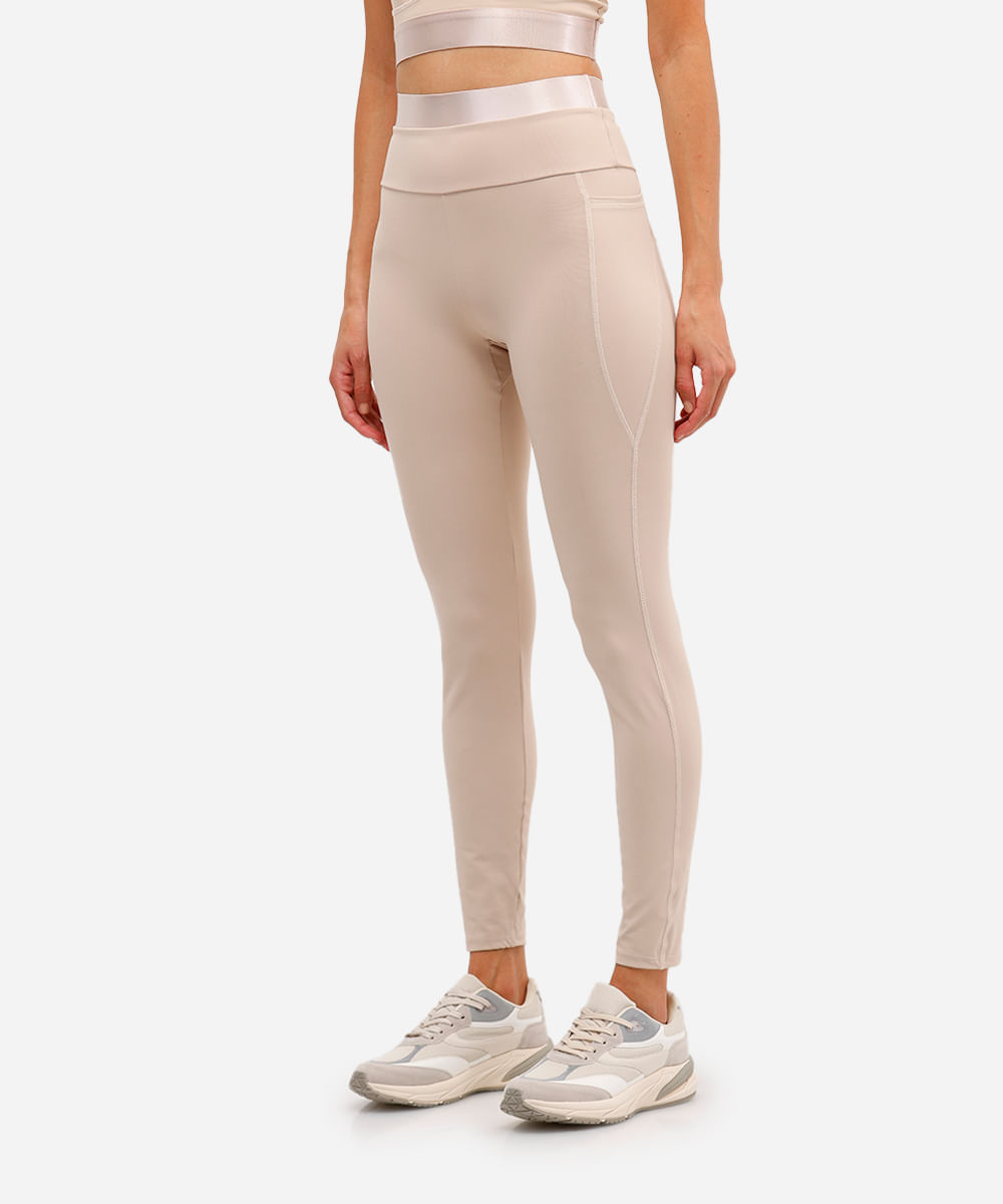 calça legging esportivacom bolsos bege