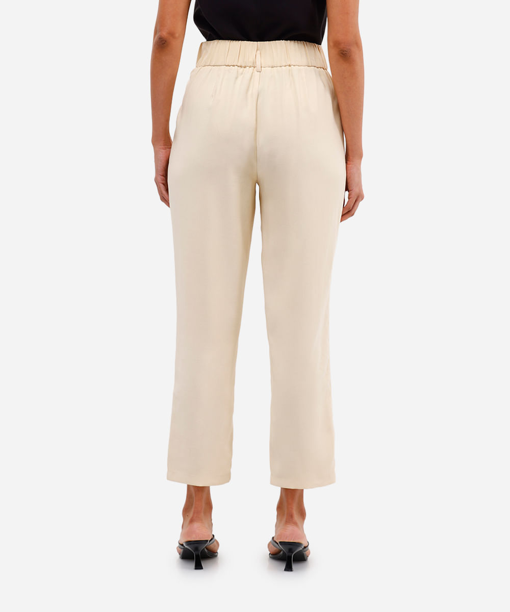 calça feminina de alfaiataria com pregas amarela
