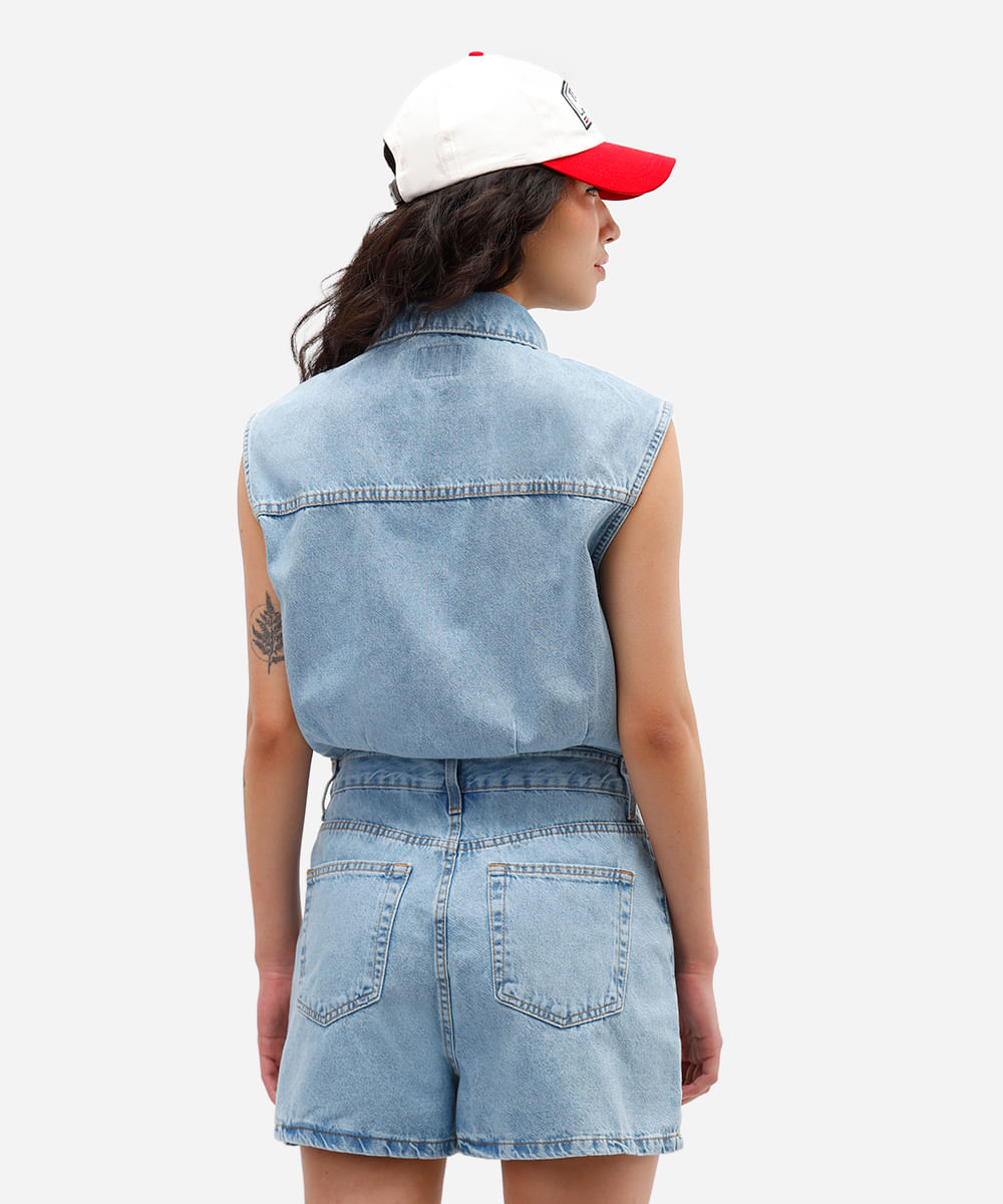 macaquinho feminino jeans com fendas azul