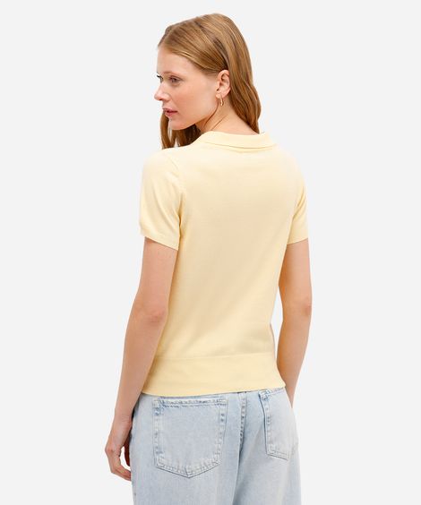 polo feminina de tricot com bolso amarela