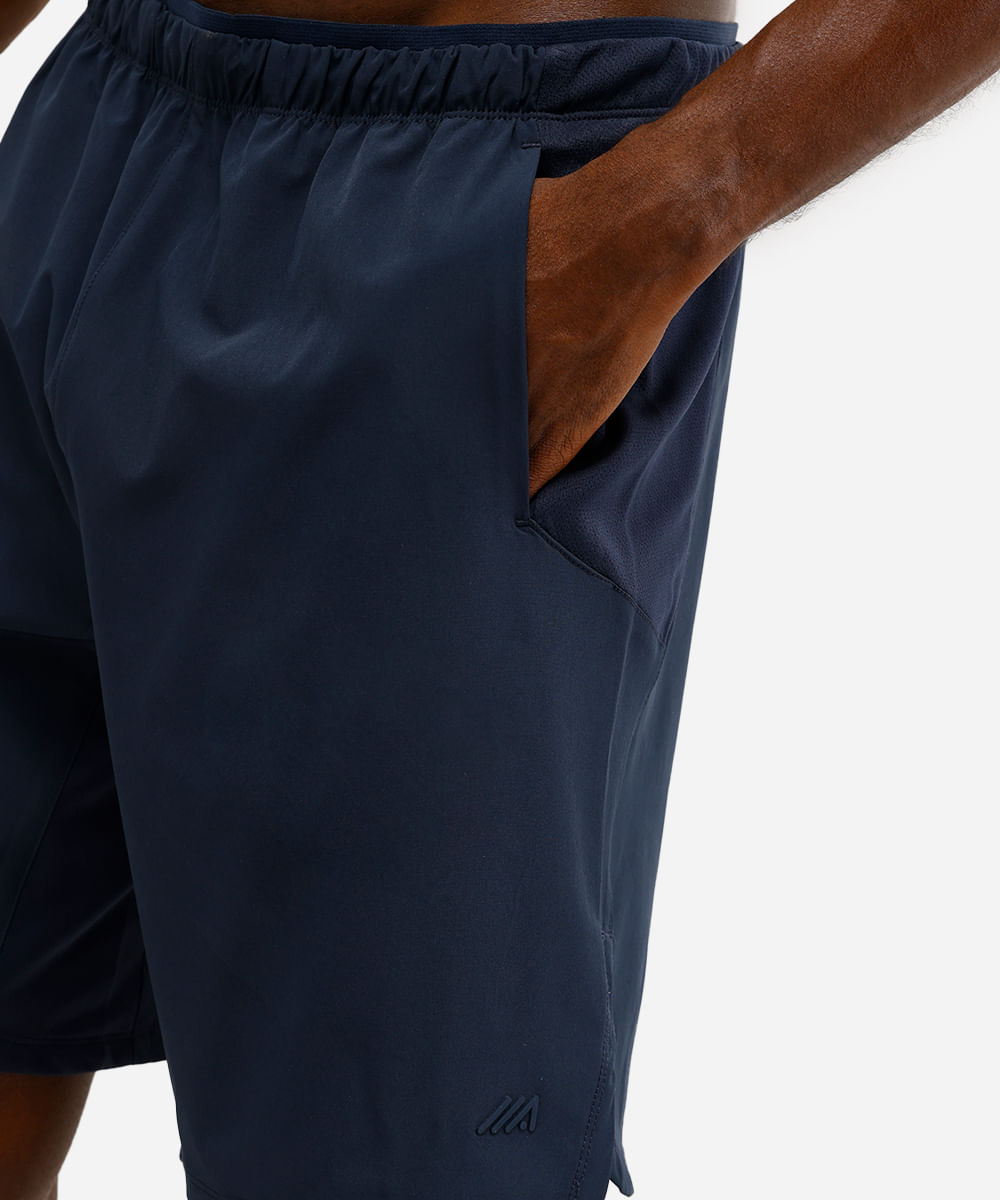 short masculino esportivo com recortes azul