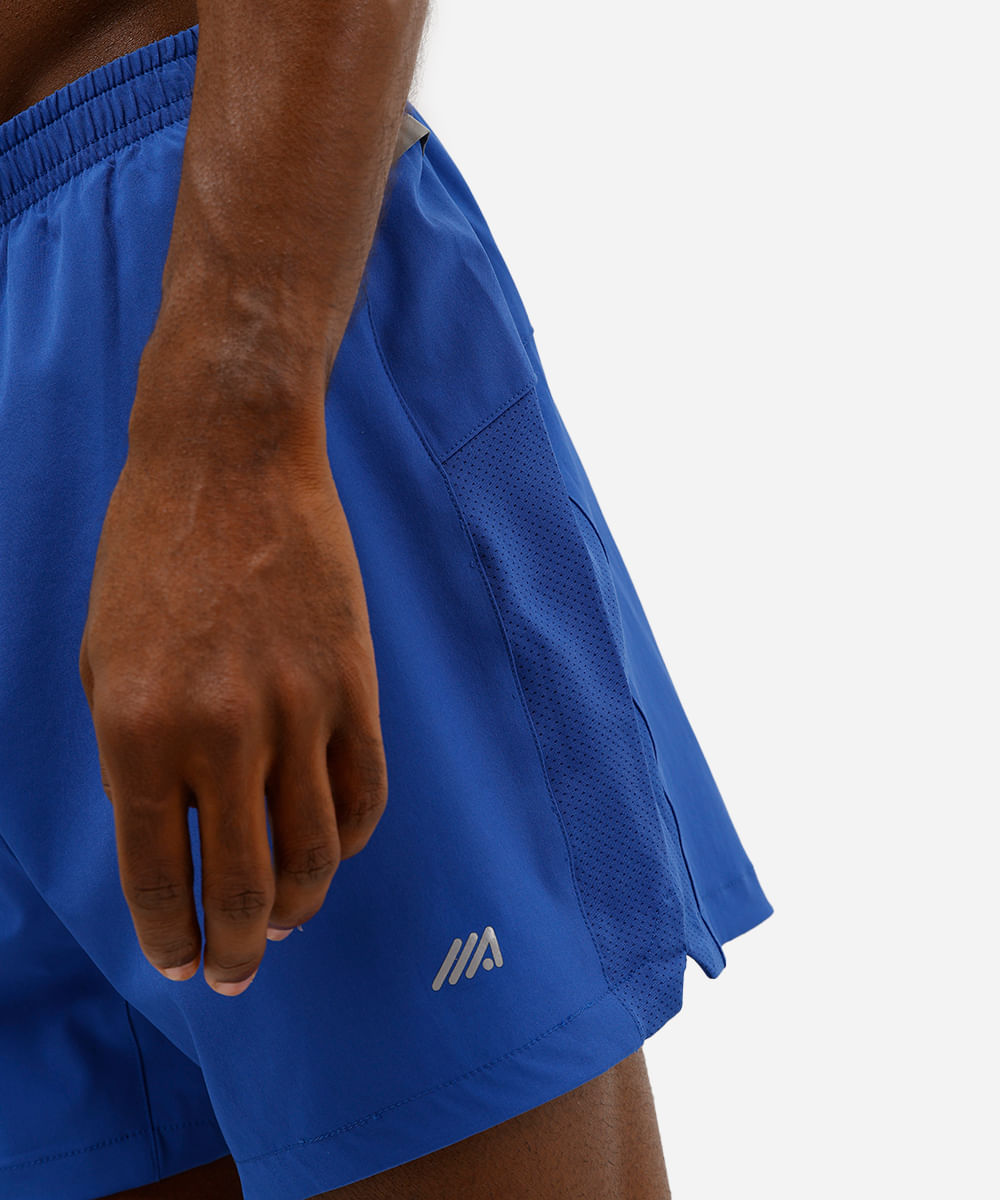 short running masculino esportivo com recorte e refletivos azul