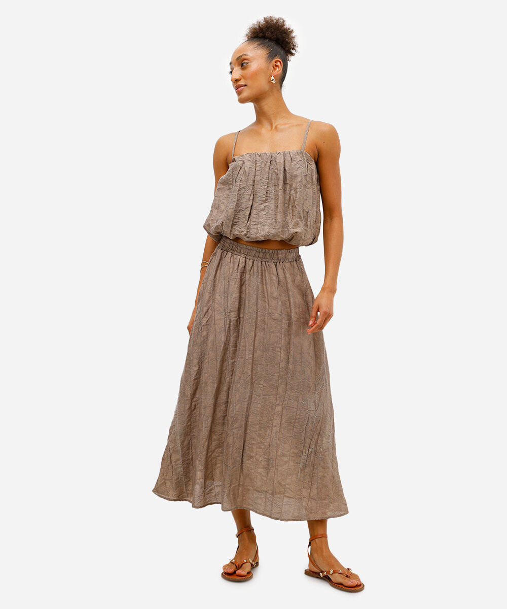 saia plissada feminina em jacquard floral bege