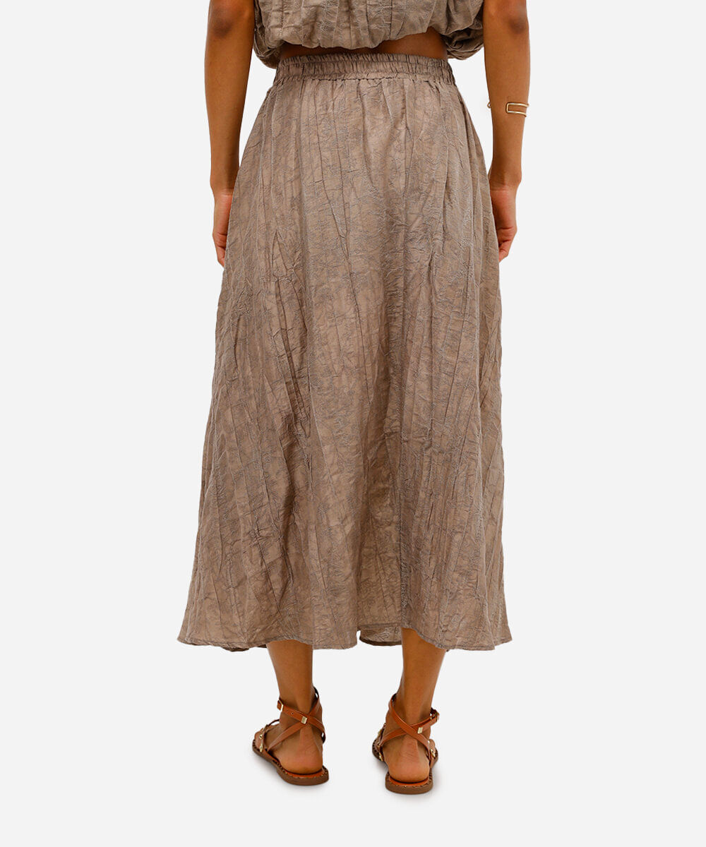 saia plissada feminina em jacquard floral bege