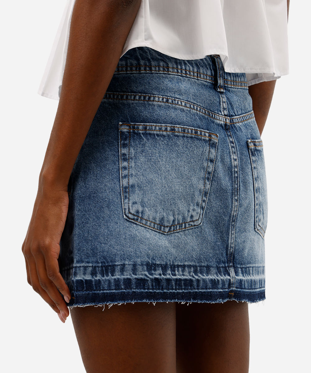 saia curta feminina jeans cintura média barra desfiada azul