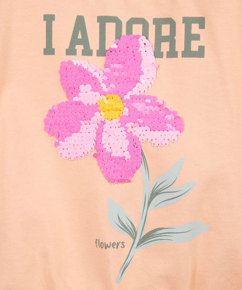 camiseta infantil barra elástico com aplicação de paetê de flor laranja