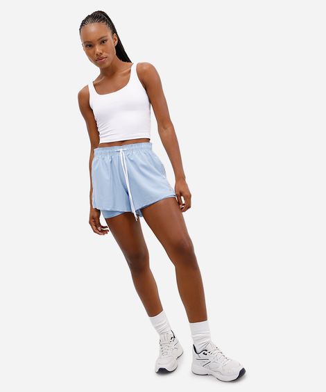 short run feminino esportivo com bermuda interna e nervuras azul