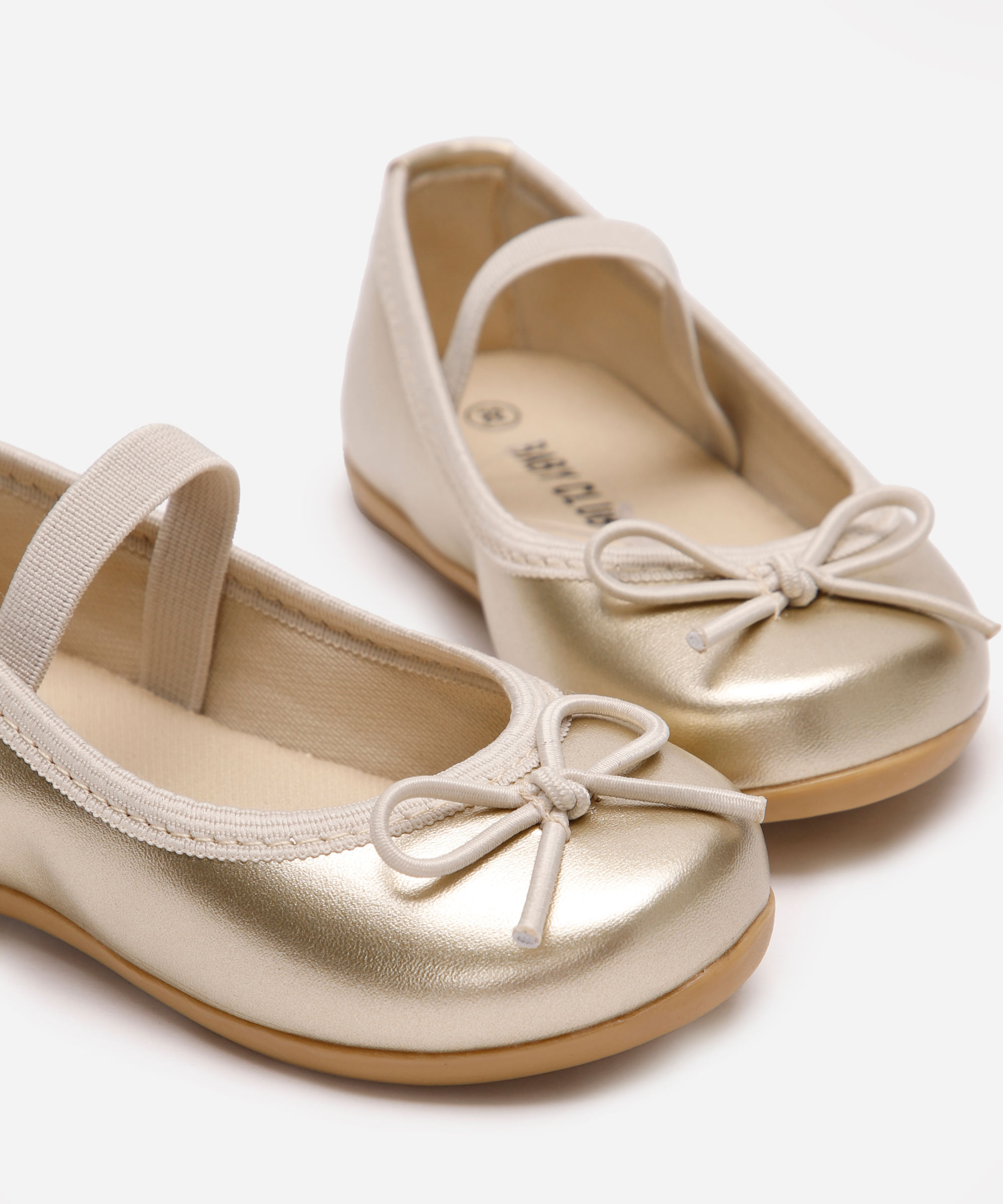 sapatilha infantil com laço dourada