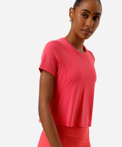 camiseta cropped feminina esportiva com recorte rosa