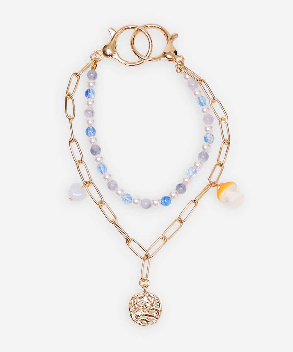 chaveiro bag charm com pérolas e cogumelo dourado