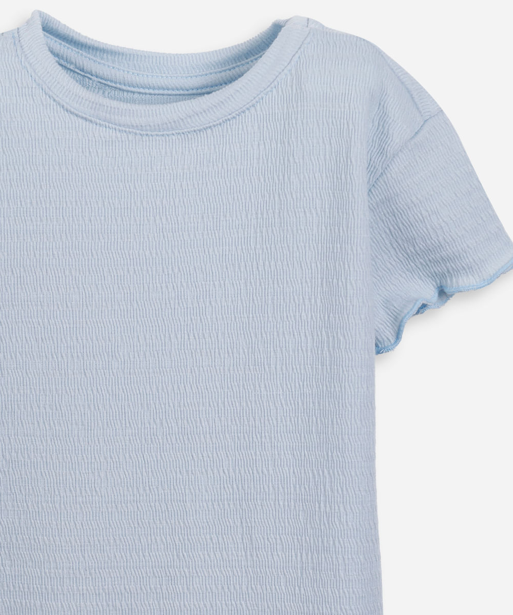 blusa infantil texturizada com frufru azul