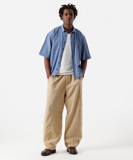 calça super baggy masculina de sarja com recortes cós elástico bege