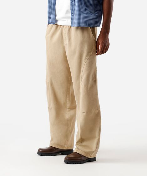 calça super baggy masculina de sarja com recortes cós elástico bege