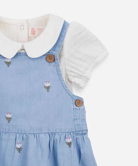 salopete infantil jeans com bordado floral e body azul