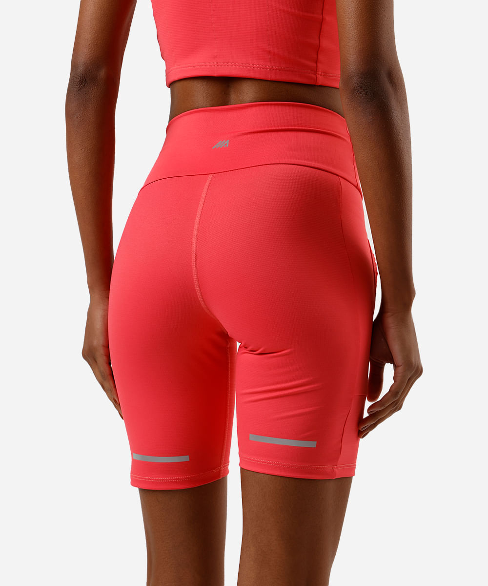 bermuda running feminina esportiva com bolsos e refletivos rosa