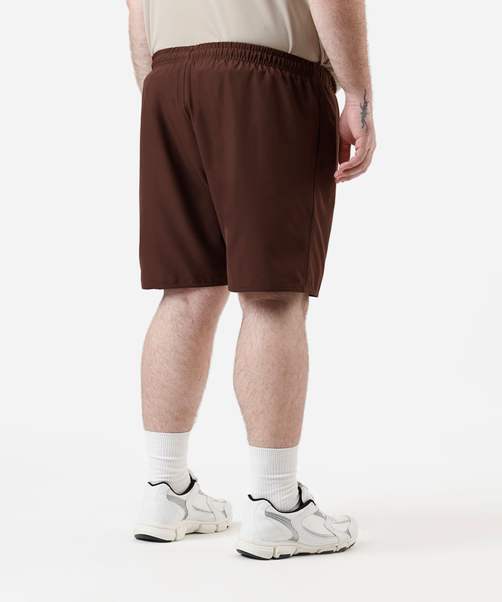 short masculino esportivo com nervura plus size marrom