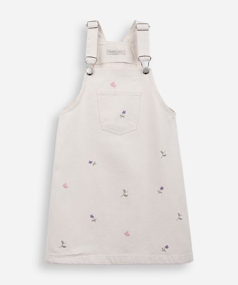 salopete infantil de sarja com bordados floral bege