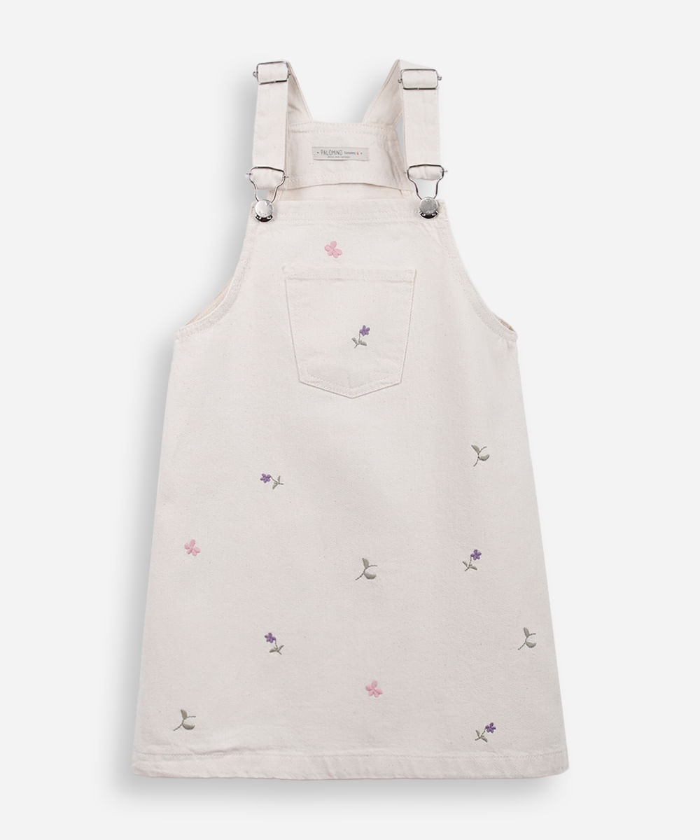 salopete infantil de sarja com bordados floral bege