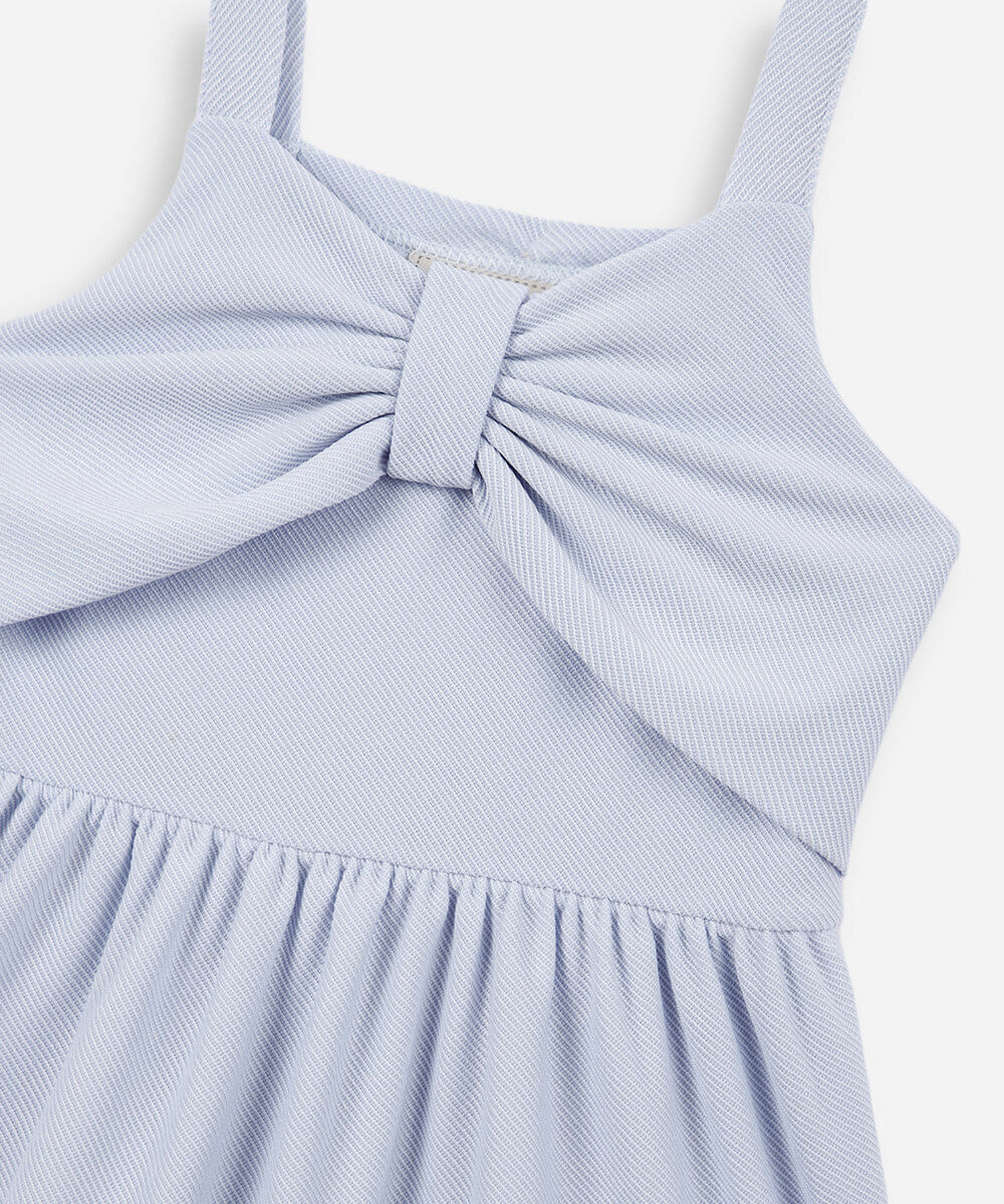 vestido infantil texturizado com laço azul