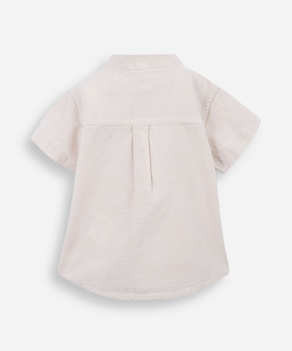 camisa infantil manga curta gola padre com bolso bege